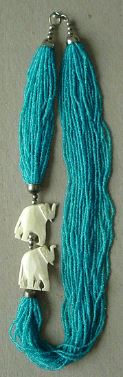 Turquoise seed beads & crved bone elephant necklace