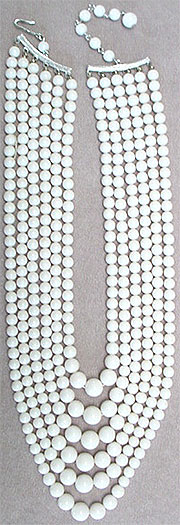 Plastic white bead necklace