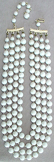 Plastic white beaded necklace