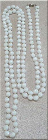 White glass bead necklace individually knotted