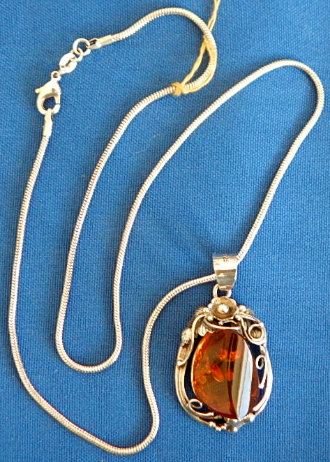 Amber pendant 20" sterling silver chain
