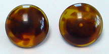 Vintage plastic round clip on earrings