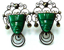 Mexican sterling carved face screw back earrings