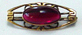 Gold garnet pin